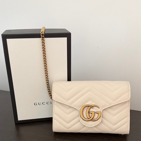 Gucci Handbags - Gucci Cream Chevron Quilted Clutch